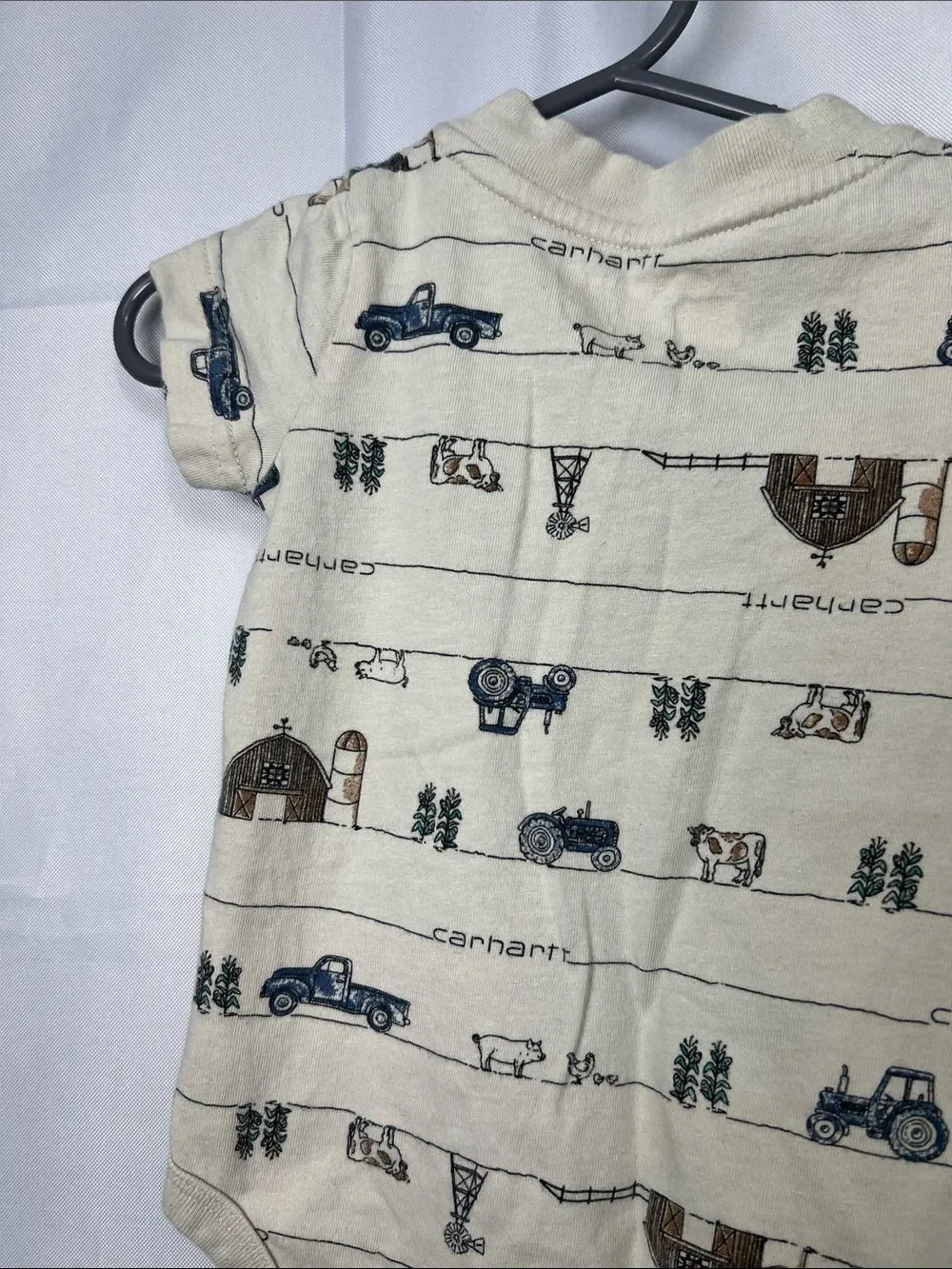 Carhartt tan farm print one piece Henley pocket tee. Size 6 months